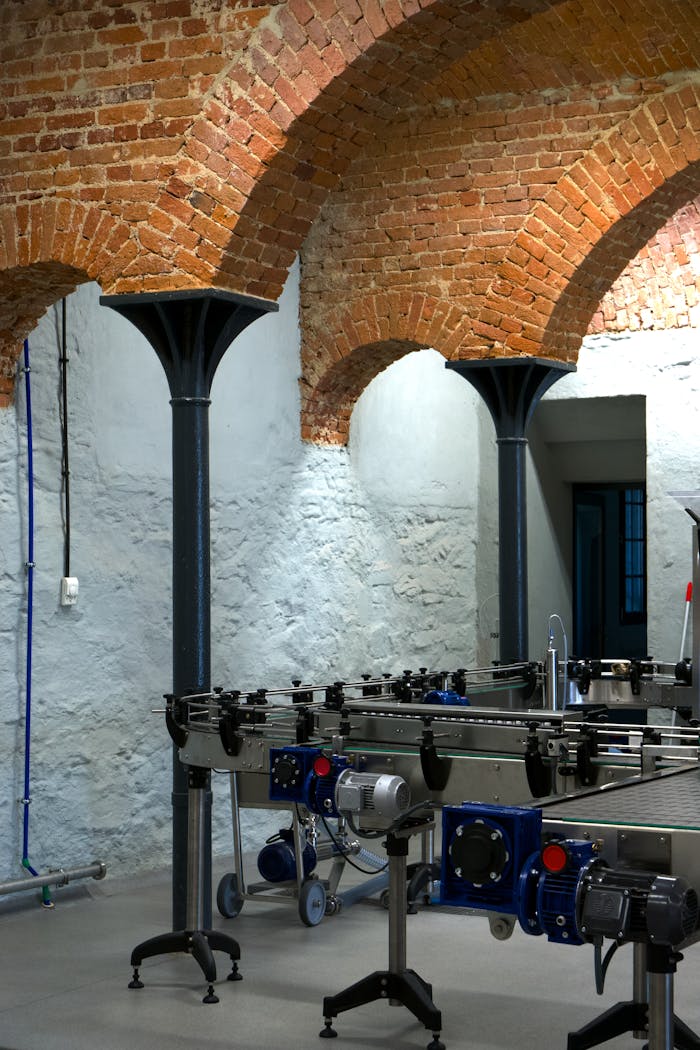 A room with a large brick archway and a machine